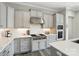 Spacious kitchen with stainless steel appliances, custom cabinets and tiled backsplash at 200 Squash Harvest Ct, Matthews, NC 28104