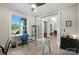 Bright office space with french doors, large window and modern glass desk at 200 Squash Harvest Ct, Matthews, NC 28104