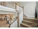 Spacious staircase overlooks the living room and kitchen at 200 Squash Harvest Ct, Matthews, NC 28104
