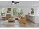 Bright living room with hardwood floors, modern furniture, and natural light at 2063 Sadler Woods Ln, Charlotte, NC 28214