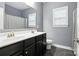 Modern bathroom with double vanity and sleek fixtures at 2377 Maple Grove Nw Ln, Concord, NC 28027
