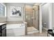 Modern bathroom features a soaking tub and separate shower at 2377 Maple Grove Nw Ln, Concord, NC 28027