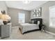 Comfortable bedroom with neutral tones and soft lighting at 2377 Maple Grove Nw Ln, Concord, NC 28027