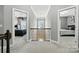 Open hallway with views into the bedrooms at 2377 Maple Grove Nw Ln, Concord, NC 28027
