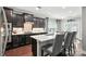 Gourmet kitchen boasts custom cabinets, a large island, and stainless appliances at 2377 Maple Grove Nw Ln, Concord, NC 28027