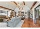 Spacious lounge area featuring hardwood floors, a high ceiling, and stylish furniture at 2377 Maple Grove Nw Ln, Concord, NC 28027