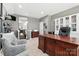 Home office with built-in shelving and a large wooden desk at 2377 Maple Grove Nw Ln, Concord, NC 28027
