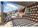 Inviting outdoor patio with brick pavers and a cozy pergola, perfect for relaxing at 2377 Maple Grove Nw Ln, Concord, NC 28027