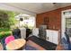 Outdoor kitchen features a stainless steel grill, and a backyard view at 3003 Wedge Ct, Matthews, NC 28104