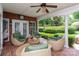 This outdoor seating area features comfortable wicker chairs and a view of the backyard at 3003 Wedge Ct, Matthews, NC 28104