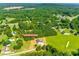 Expansive aerial view showcases the house and surrounding community amidst lush foliage at 3248 Ferguson Long Rd at 3248 Ferguson Long Rd, York, SC 29745