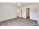 Large, bright bedroom with neutral walls and view to closet with wire shelving at 3248 Ferguson Long Rd, York, SC 29745