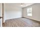 Bedroom with neutral walls, ceiling fan and a window providing natural light at 3248 Ferguson Long Rd, York, SC 29745