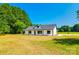 Charming single-story home with black trim, white siding, and green lawn at 3248 Ferguson Long Rd, York, SC 29745