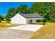 Home exterior with a long driveway and side carport at 3248 Ferguson Long Rd, York, SC 29745
