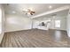 Bright, open living space blending with the kitchen, boasting modern floors and recessed lighting at 3248 Ferguson Long Rd, York, SC 29745