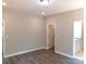 A spacious bedroom with luxury vinyl flooring and neutral paint is move-in ready at 372 Lippard Farm Rd, Statesville, NC 28625