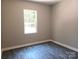 Bedroom with natural light, vinyl flooring and neutral walls is move-in ready at 372 Lippard Farm Rd, Statesville, NC 28625