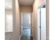 Hallway with vinyl floors featuring multiple doorways to other rooms at 372 Lippard Farm Rd, Statesville, NC 28625
