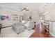 Inviting living room with hardwood floors, a comfortable sofa, and a decorative mirror at 3816 Ernie Dr, Charlotte, NC 28269