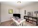 Well-lit office space with neutral walls, a modern desk with dual monitors, and stylish decor for a comfortable workspace at 3816 Ernie Dr, Charlotte, NC 28269