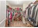 Spacious walk-in closet with ample storage, multiple shelves, and room for shoes and accessories at 3816 Ernie Dr, Charlotte, NC 28269