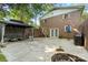 Beautiful backyard featuring a patio, gazebo, fire pit, grill, and lush landscaping at 4322 Greenhaven Ln, Gastonia, NC 28056