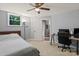 Inviting bedroom with carpet, a cozy bed, window and a convenient workspace at 4322 Greenhaven Ln, Gastonia, NC 28056