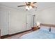 Bedroom with ample lighting, wood floors, ceiling fan and large closet at 4322 Greenhaven Ln, Gastonia, NC 28056