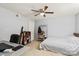Cozy bedroom with neutral walls, ceiling fan, and a comfortable space for relaxation at 4322 Greenhaven Ln, Gastonia, NC 28056