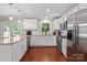 Modern kitchen features stainless steel appliances, granite countertops and ample cabinet space at 4322 Greenhaven Ln, Gastonia, NC 28056