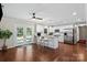Bright, modern kitchen with stainless steel appliances, white cabinetry, and an open view to the backyard at 4322 Greenhaven Ln, Gastonia, NC 28056
