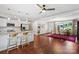Bright and airy living area with an open floor plan, seamlessly connecting the dining and kitchen spaces at 4322 Greenhaven Ln, Gastonia, NC 28056