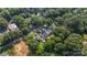 A captivating aerial of the home nestled amongst trees, showcasing its prime location at 4349 Castleton Rd, Charlotte, NC 28211