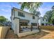 Beautiful home exterior with a modern deck, creating a perfect outdoor oasis at 4349 Castleton Rd, Charlotte, NC 28211