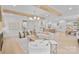 Open-concept living room with fireplace and seamlessly connected to a kitchen and dining area at 4349 Castleton Rd, Charlotte, NC 28211