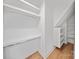 Walk-in closet boasts built-in shelving and ample storage space at 4349 Castleton Rd, Charlotte, NC 28211