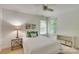 Bright bedroom featuring neutral carpet and a large bed with decorative pillows at 5051 Carillon Way, Charlotte, NC 28270