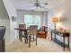 Cozy bonus room with a table, chairs, comfortable seating, and a window for natural light at 5051 Carillon Way, Charlotte, NC 28270