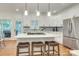 Modern kitchen with stainless steel appliances and a large center island at 5051 Carillon Way, Charlotte, NC 28270