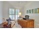 Comfortable home office with natural light and a cozy armchair at 5051 Carillon Way, Charlotte, NC 28270