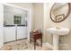 Functional laundry room with modern appliances and a sink at 5205 Tedorill Ln, Charlotte, NC 28226