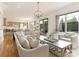 Spacious living room with a neutral color palette, plenty of seating, and natural light at 628 Cherry St, Charlotte, NC 28204