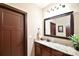 Bathroom features a granite countertop, undermount sink, and vanity cabinet for a stylish touch at 670 Cricket Ln, Mt Ulla, NC 28125