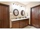 Spacious bathroom boasting dual sinks, granite countertops, and two doors for added comfort at 670 Cricket Ln, Mt Ulla, NC 28125