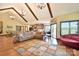 Open floorplan featuring living room, dining area, and kitchen with wood floors and ample space at 670 Cricket Ln, Mt Ulla, NC 28125