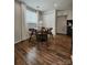 This dining area has a round table and is located next to the kitchen at 7228 Rollingridge Dr, Charlotte, NC 28211