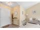 Inviting foyer featuring neutral paint, a stylish table, and an open view of the living area at 7616 Shiny Meadow Ln, Charlotte, NC 28215