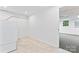 View of basement with tile flooring, utility hookups and access to potential 5th bedroom at 9833 White Cascade Dr, Charlotte, NC 28269