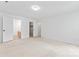 A spacious carpeted bedroom with multiple closets and access to an attached bathroom at 9833 White Cascade Dr, Charlotte, NC 28269